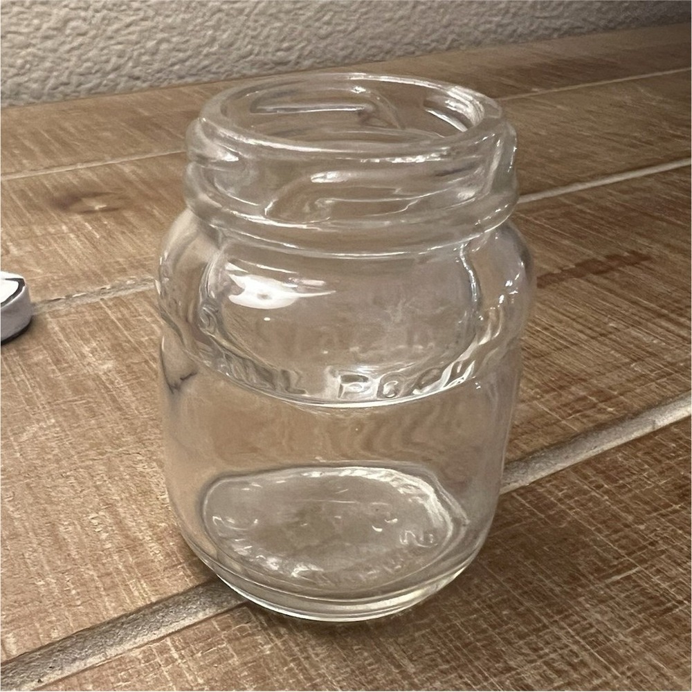 Schreyers Clear Glass Jar Bottle with Embossed Lid Lid